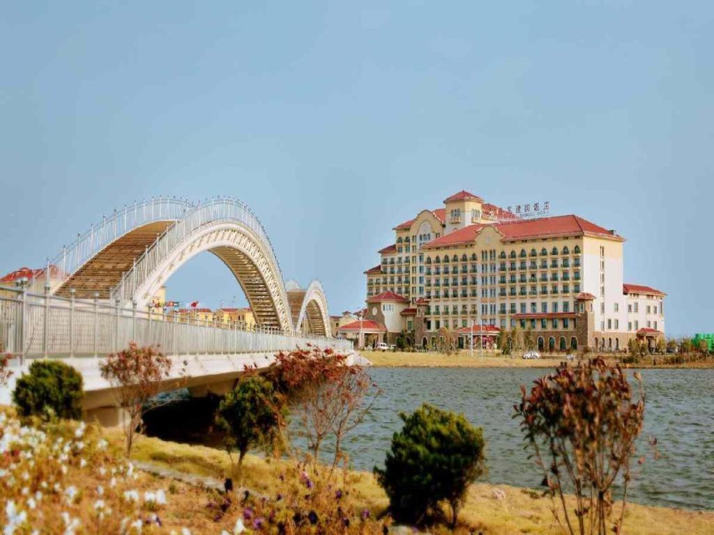 Haiyang Shenglong Jianguo Hotel Fengcheng  Экстерьер фото