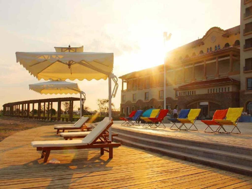 Haiyang Shenglong Jianguo Hotel Fengcheng  Экстерьер фото