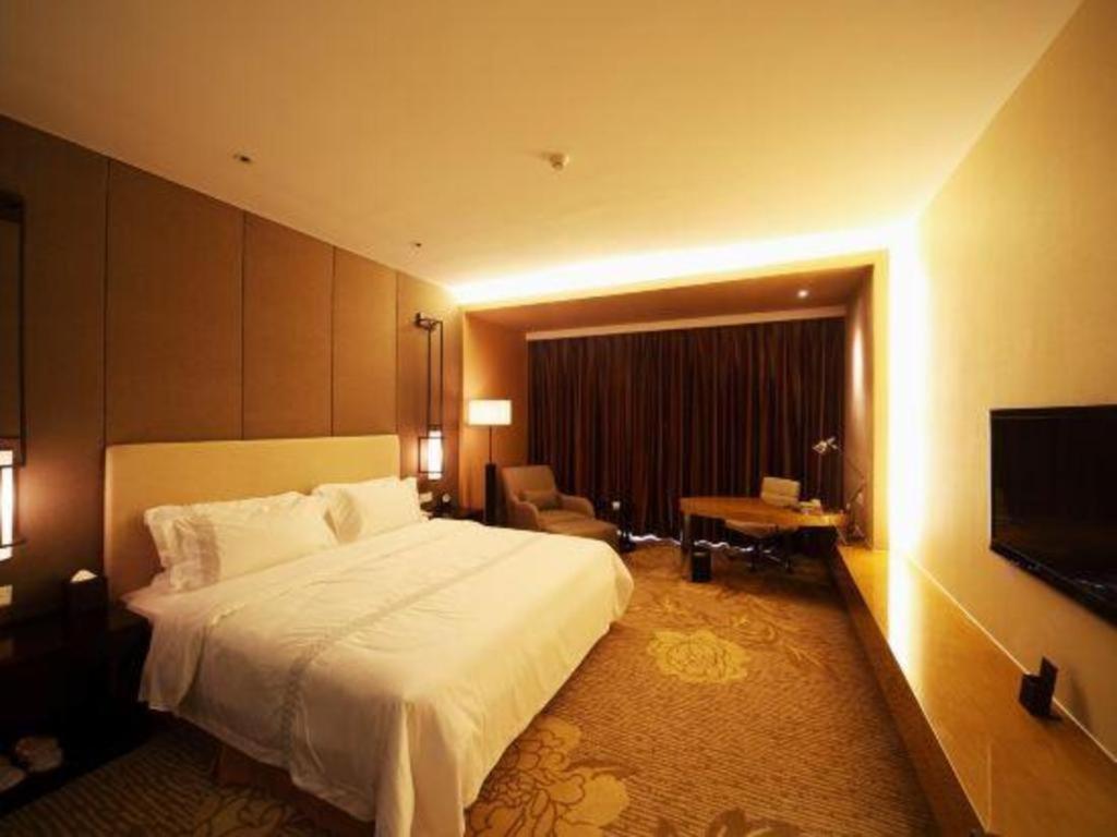 Haiyang Shenglong Jianguo Hotel Fengcheng  Экстерьер фото