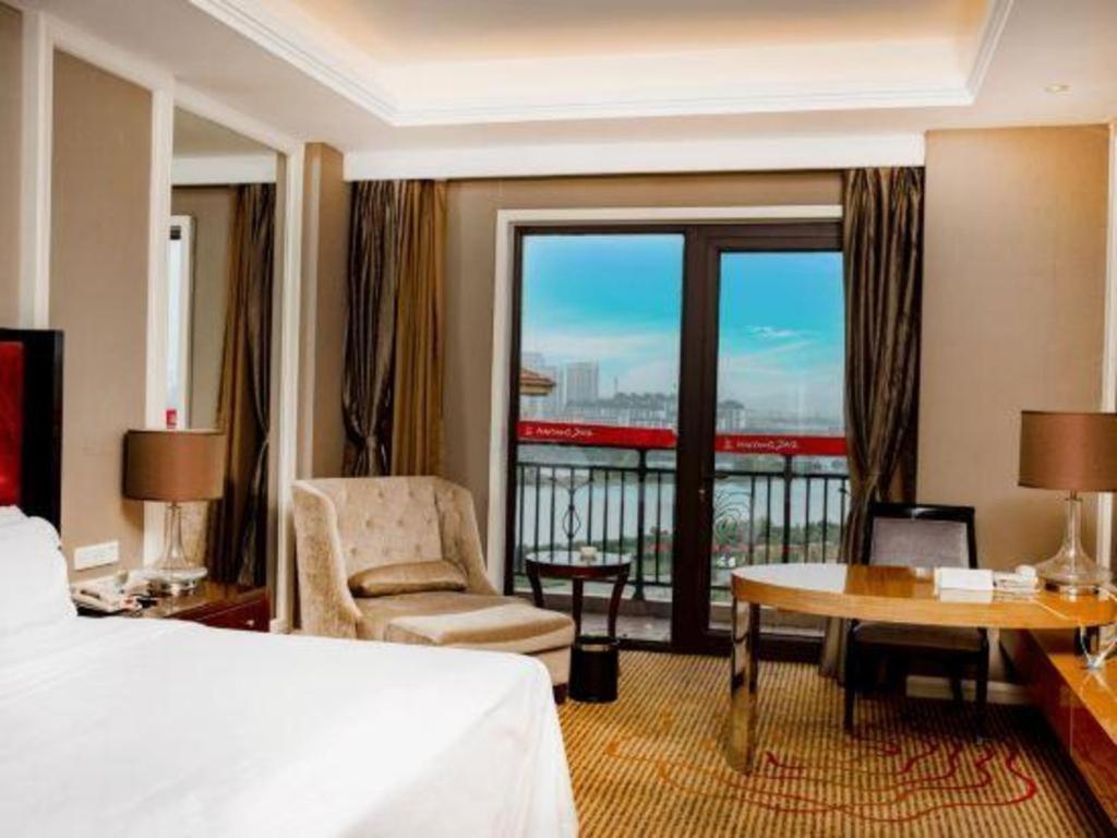 Haiyang Shenglong Jianguo Hotel Fengcheng  Экстерьер фото