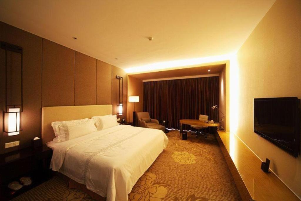 Haiyang Shenglong Jianguo Hotel Fengcheng  Экстерьер фото